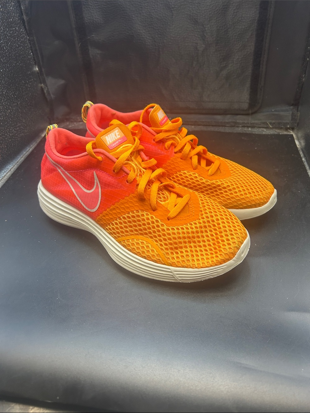 Nike Women’s Orange and Red Mesh Athletic Sneakers